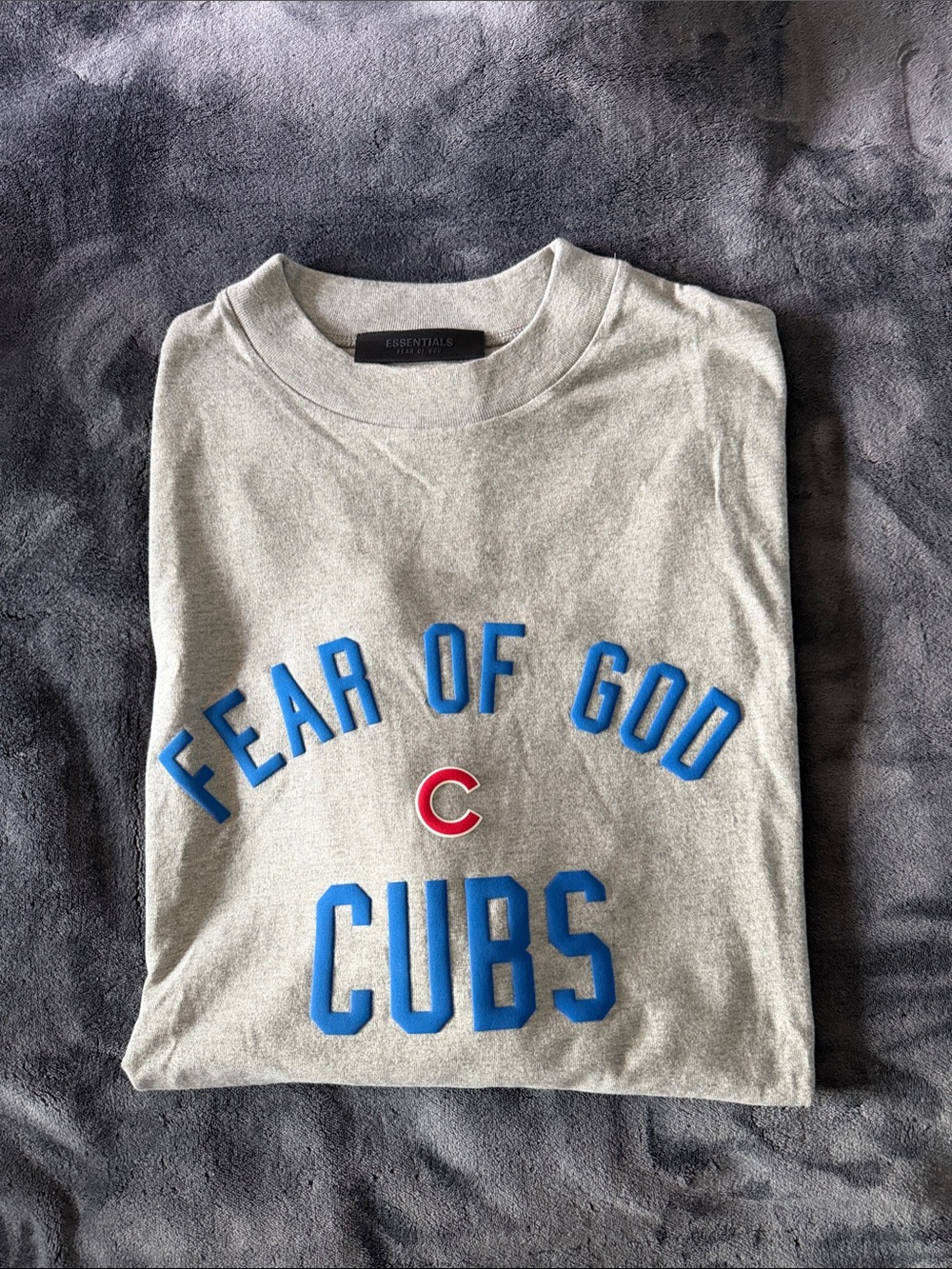 Fear of God Gray Tee with Blue Lettering and Red Accent